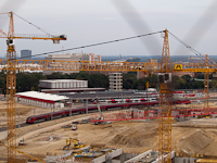 An BB railjet at the Vienna Main Station still under construction