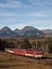 The ŽSSK 163 110-0 is hauling a stopping train between Csorba (Štrba) and Csorba megll (Štrba zastvka)