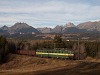 The ŽSCS 131 077-0 is hauling a freight train between Csorba (Štrba) and Csorba megll (Štrba zastvka) in the High Tatras