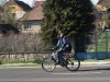 A railway photographer on a bike