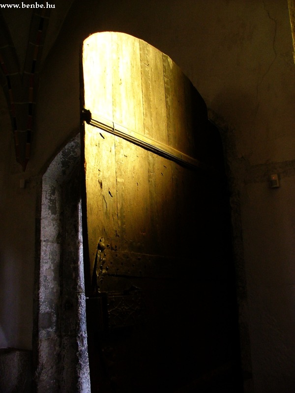 The massive Southern entrance in the church at Gyngyspata photo