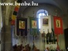 The ceremonial flags and the side-altar of the church of Gyngyspata