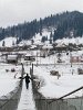 A locally made bridge over the icy Maros river