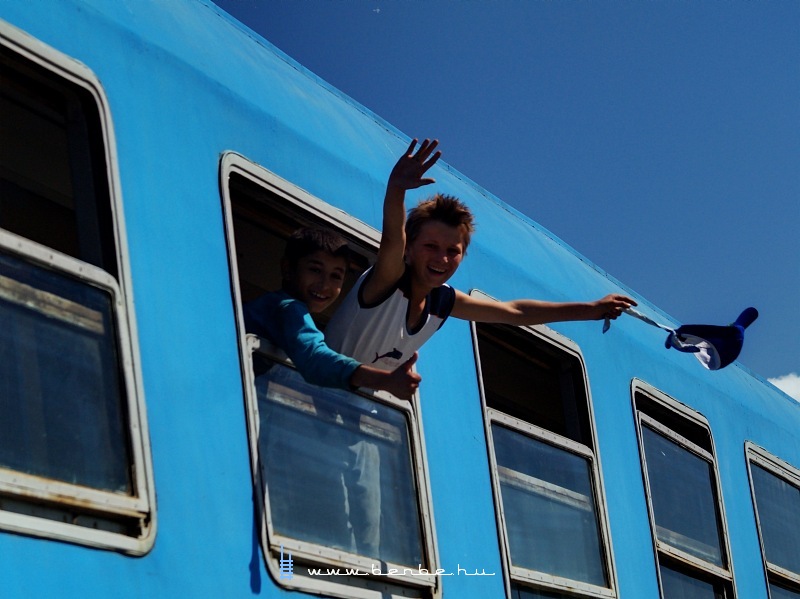 The passangers of the fast train (pacing at about 20 km/h) are very happy to meet us photo
