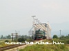 The 2M62 1202 leaving the bridge of the river Talabor at Bustyahza (Буштино)