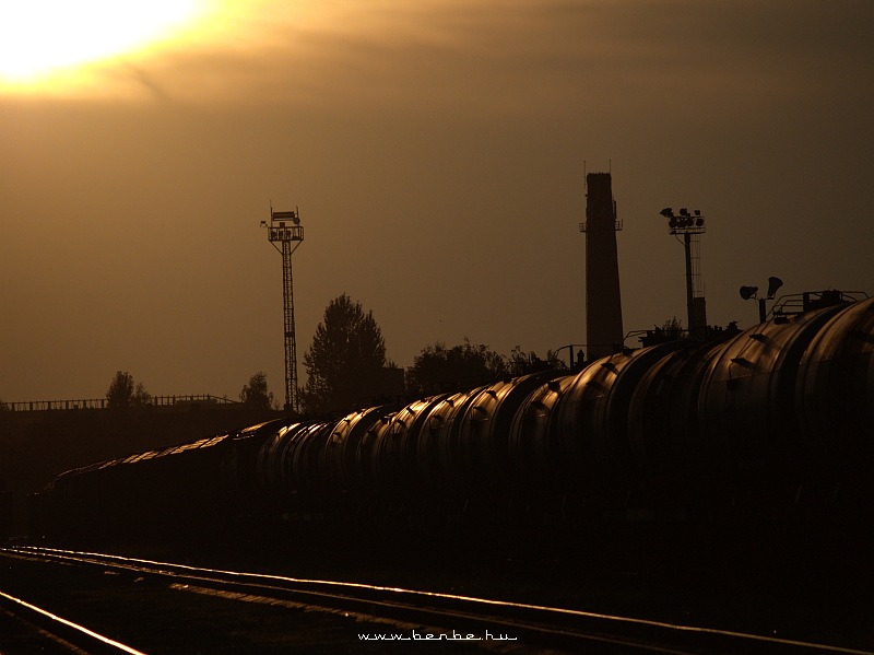 A freight train in the sunset at Kolomiya photo