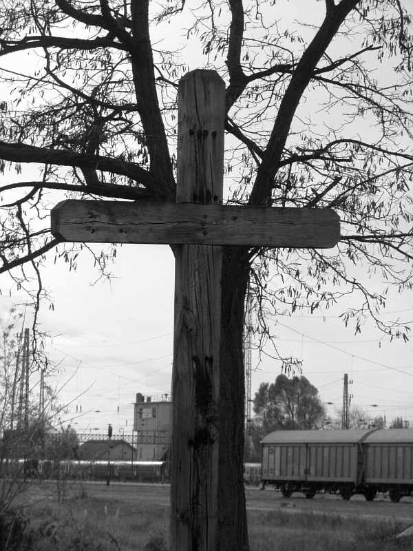 A cross at the bottom of the watertower at Hatvan photo