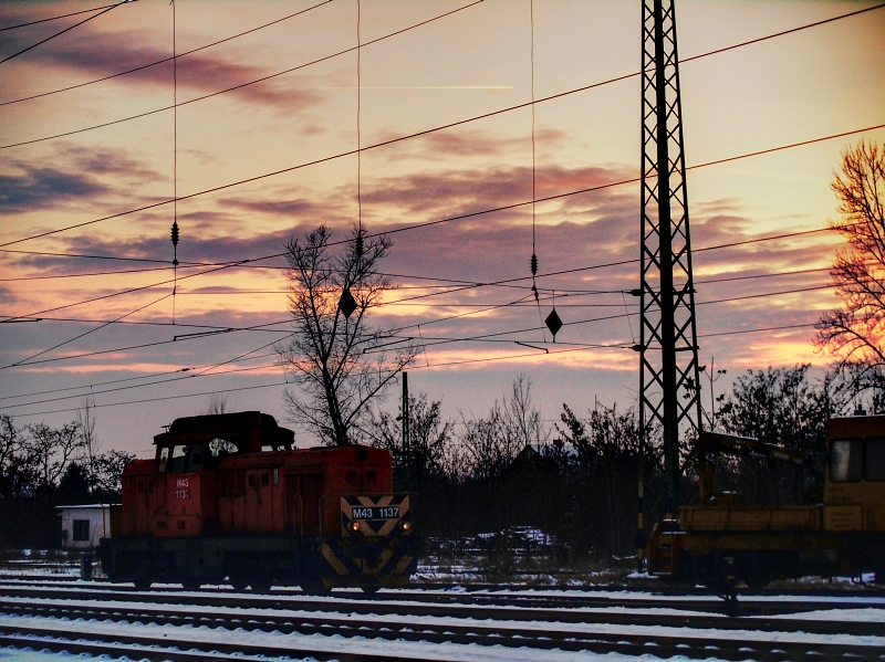 The M43 1137 during sunset at the snow-covered Hatvan photo