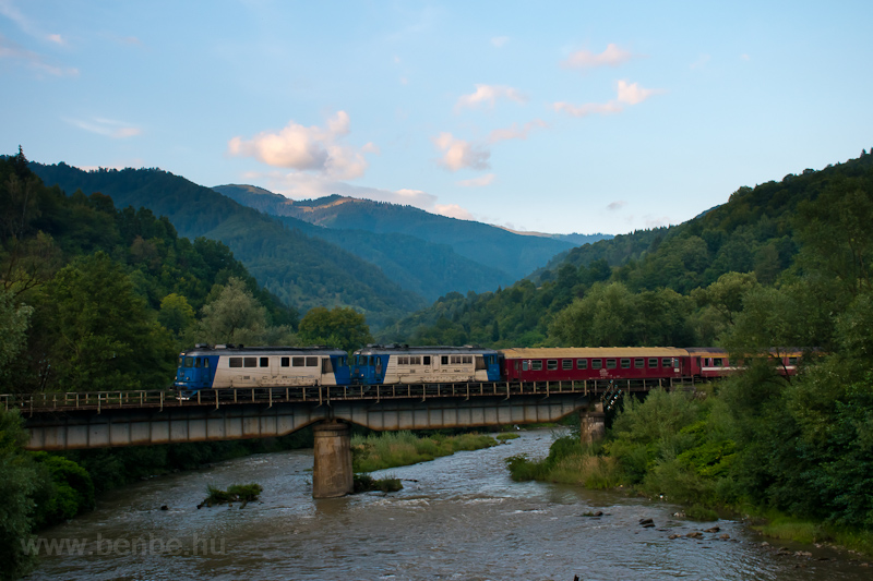 The CFR Calatori 60 1156-8 and 60 1356-9 seen hauling a fast train to Sighetu Marmatiei on the the bridge of the Viseu river between Petrova and Bistra Viseului photo