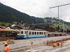 The MOB Be 4/4 1002 internal usage railcar seen at Zweisimmen shunting gravel cars