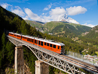 The Gornergratbahn Bhe 4/6 3082 seen between Findelbach and Zermatt