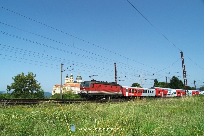 The 1144 277 is pushing a varying height push-pull train near the Melk abbey photo