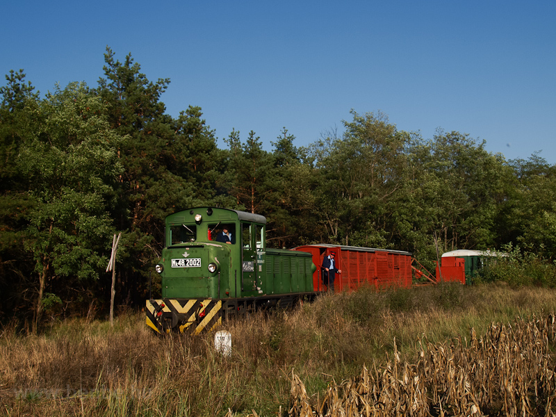 The Mk48,2002 is hauling a mixed passenger/freight train between Smsoni t logs loading area and Martinka stop photo