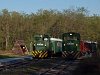 The Mk48,2002 is hauling a mixed passenger/freight train and the Mk48,2009 with a passenger train at Smsoni t logs loading area